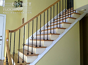 Custom wood StaircaseInstallation by District Flooring & Restoration 