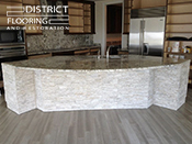 Natural stone installation by District Flooring & Restoration 
